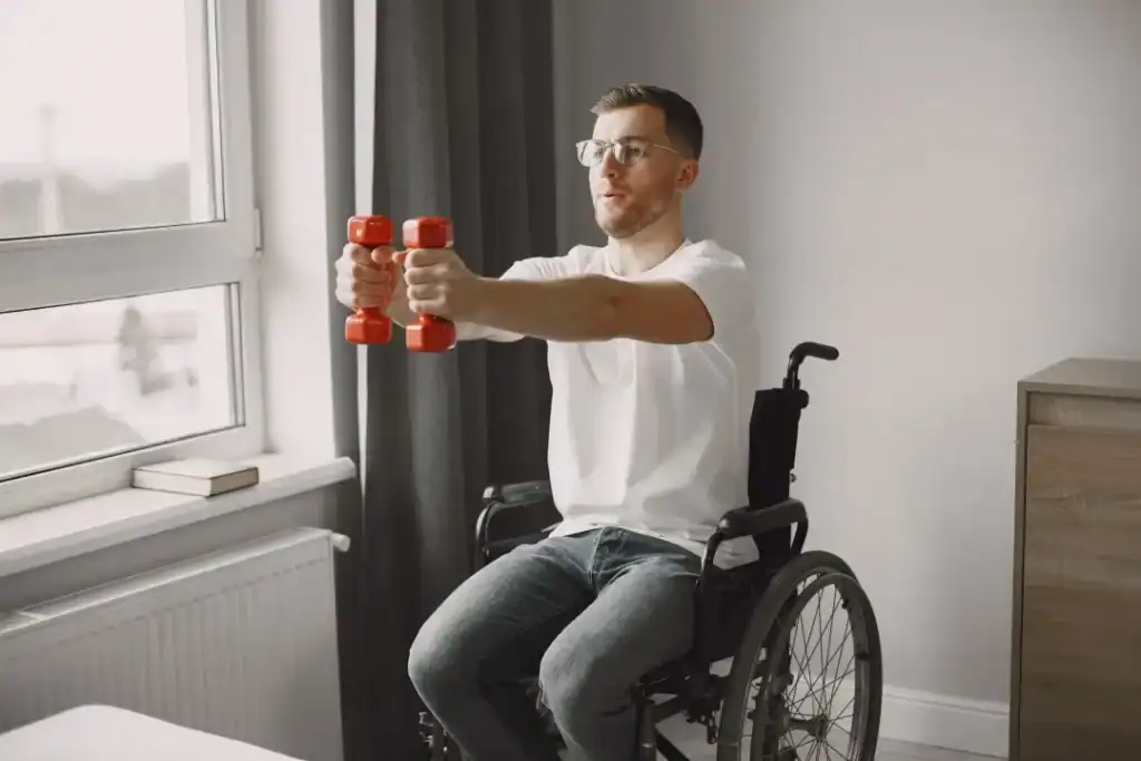 Empowering Weight Loss: A Comprehensive Guide for Individuals with Disabilities 1 Image of man doing exercise in his wheelchair to aid weight loss Slough
